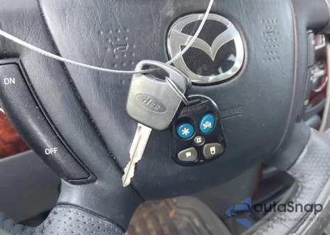 2004 Mazda Tribute Es V6 z USA, uszkodzony, nr VIN 4F2CZ06144KM16811